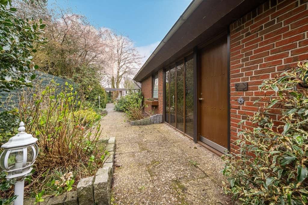 Immobilie in Süderlügum - Umfassend modernisiertes Einfamilienhaus mit Garage auf herrlichem Südgrundstück - Bild 4