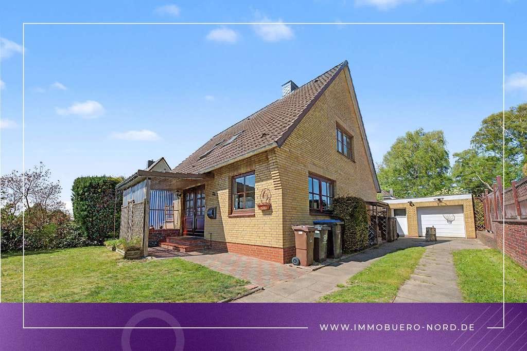 Immobilie in Breitenburg - Vermietetes Einfamilienhaus mit Garage - Bild 0