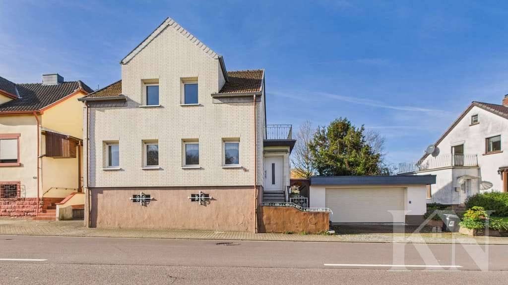 Immobilie in Heusweiler - Geräumiges Einfamilienhaus mit Garten, Garage und vielfältigen Möglichkeiten! - Bild 0