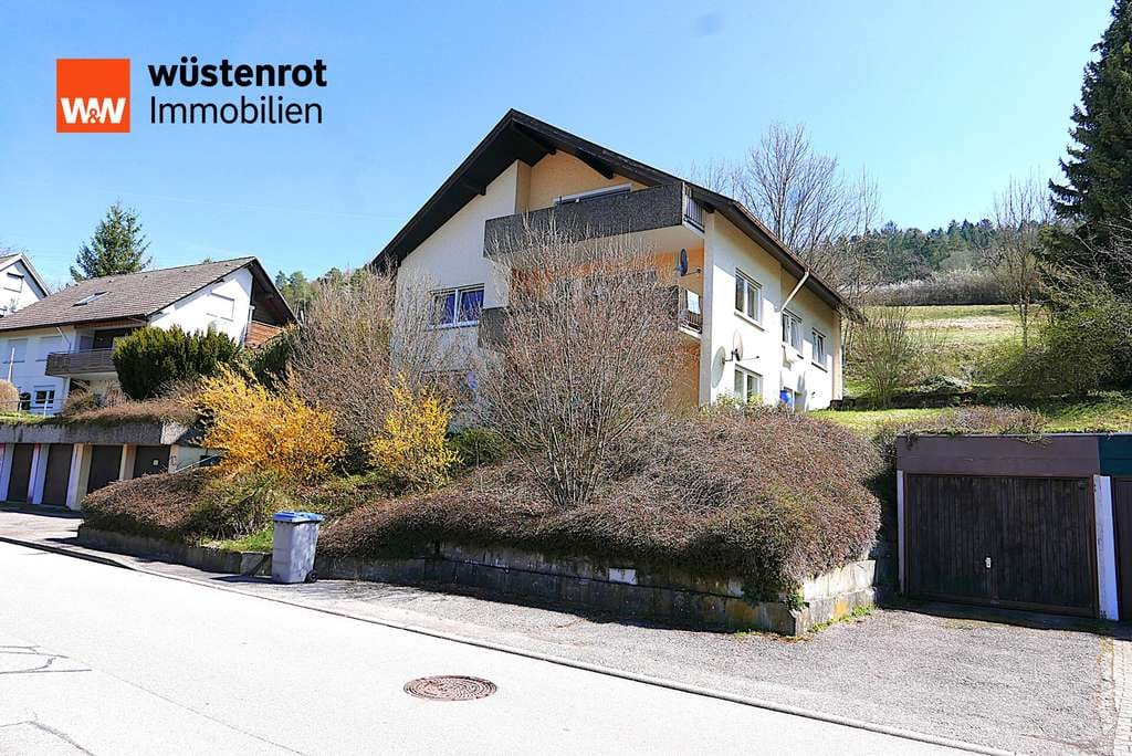 Immobilie in Glatten - Zweifamilienhaus mit Einliegerwohnung und drei Garagen in Glatten in bester Aussichtslage. - Bild 0