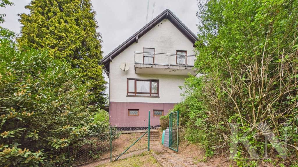 Immobilie in Eppelborn - Einfamilienhaus mit großem Grundstück und vielseitigem Potenzial - Bild 4