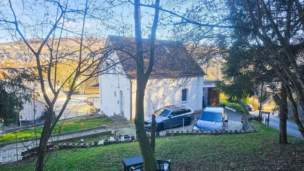Immobilie in Herdorf - Charmantes Einfamilienhaus mit modernen Komfort und Garten - Erdwärme, Terrasse & viel Potenzial! - Bild 1