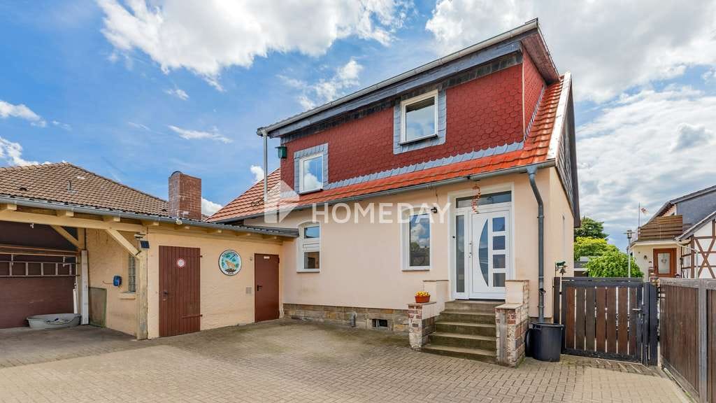 Immobilie in Grafhorst - Familienfreundliches Eigenheim mit Nebenhaus, Terrasse und Carport - Bild 3