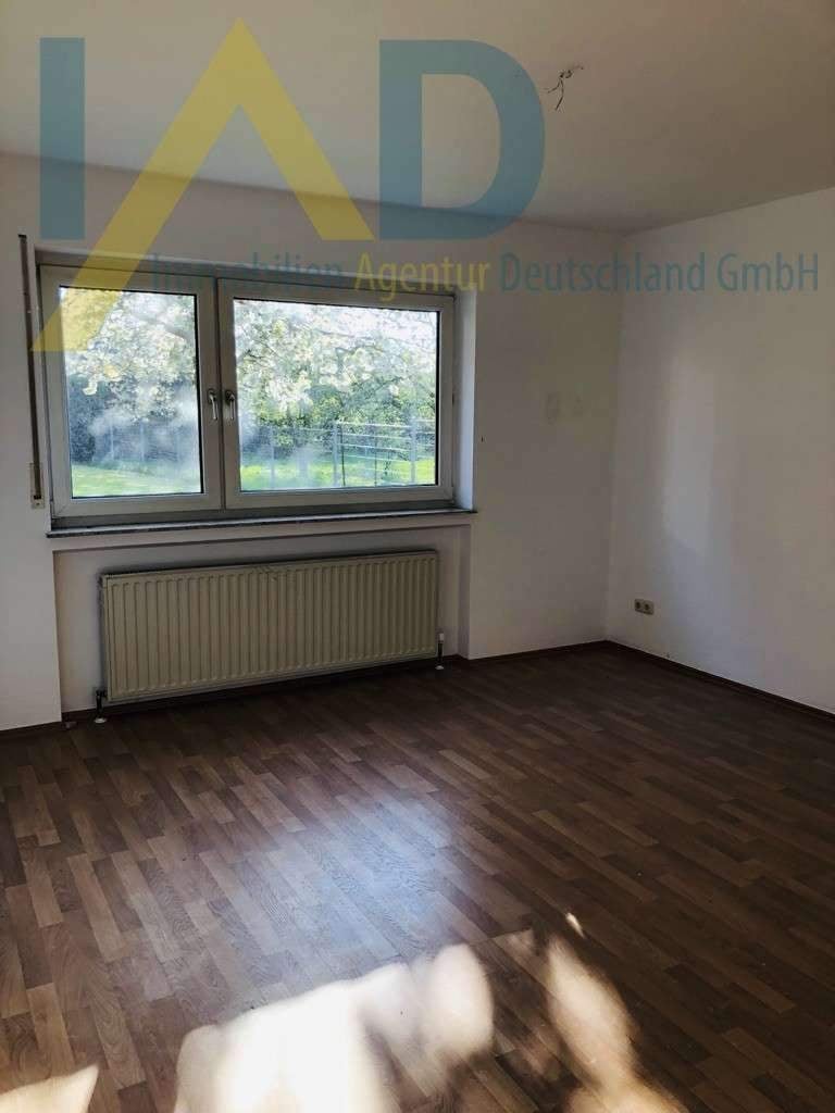 Immobilie in Lollar - Lichtdurchflutete 3-Zimmer-Wohnung mit Terrasse und Tiefgaragenstellplatz - Bild 3