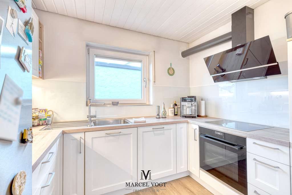 Immobilie in Wolfschlugen - Lichtdurchflutete Erdgeschosswohnung mit Garten & Terrasse – Wohnen auf zwei Ebenen - Bild 3