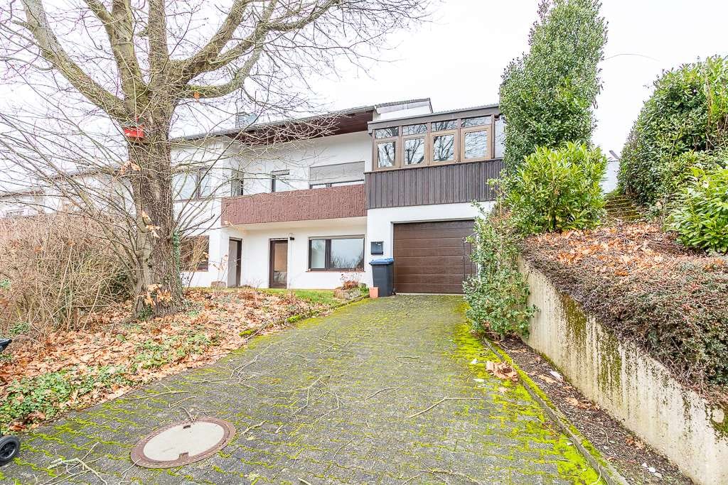 Immobilie in Gusterath - Charmantes Einfamilienhaus mit Einliegerwohnung und großem Potenzial in idyllischer Wohnlage - Bild 1