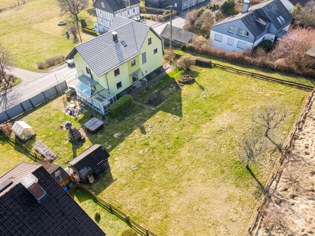 Immobilie in Netphen - VR IMMO: Familienfreundliches Einfamilienhaus mit vielseitigem Wohnkonzept, großem Garten und Sauna! - Bild 4
