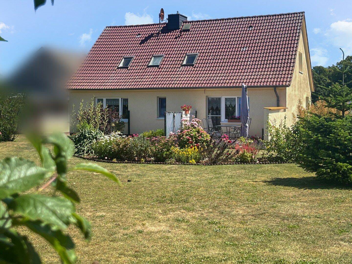 Immobilie in Krummin - Hübsches Einfamilienhaus mit großem Garten und 2 Ferienwohnungen in Krummin auf Usedom - Bild 1