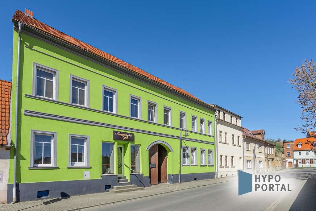 Immobilie in Teuchern - Vielseitiges Mehrfamilienhaus mit 4 Wohneinheiten und 1 Gewerbeeinheit in Teuchern - Bild 1
