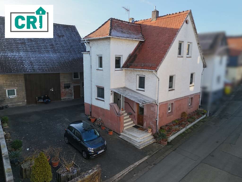 Immobilie in Kirchhain - Raum für Wohnen und Hobby: Einfamilienhaus mit Scheune und Werkstatt - Bild 0