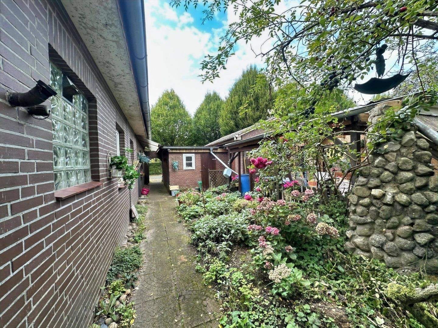 Immobilie in Fintel - Zweifamilienhaus mit großem Grundstück in Fintel - Platz für Ideen und Familie - Bild 4