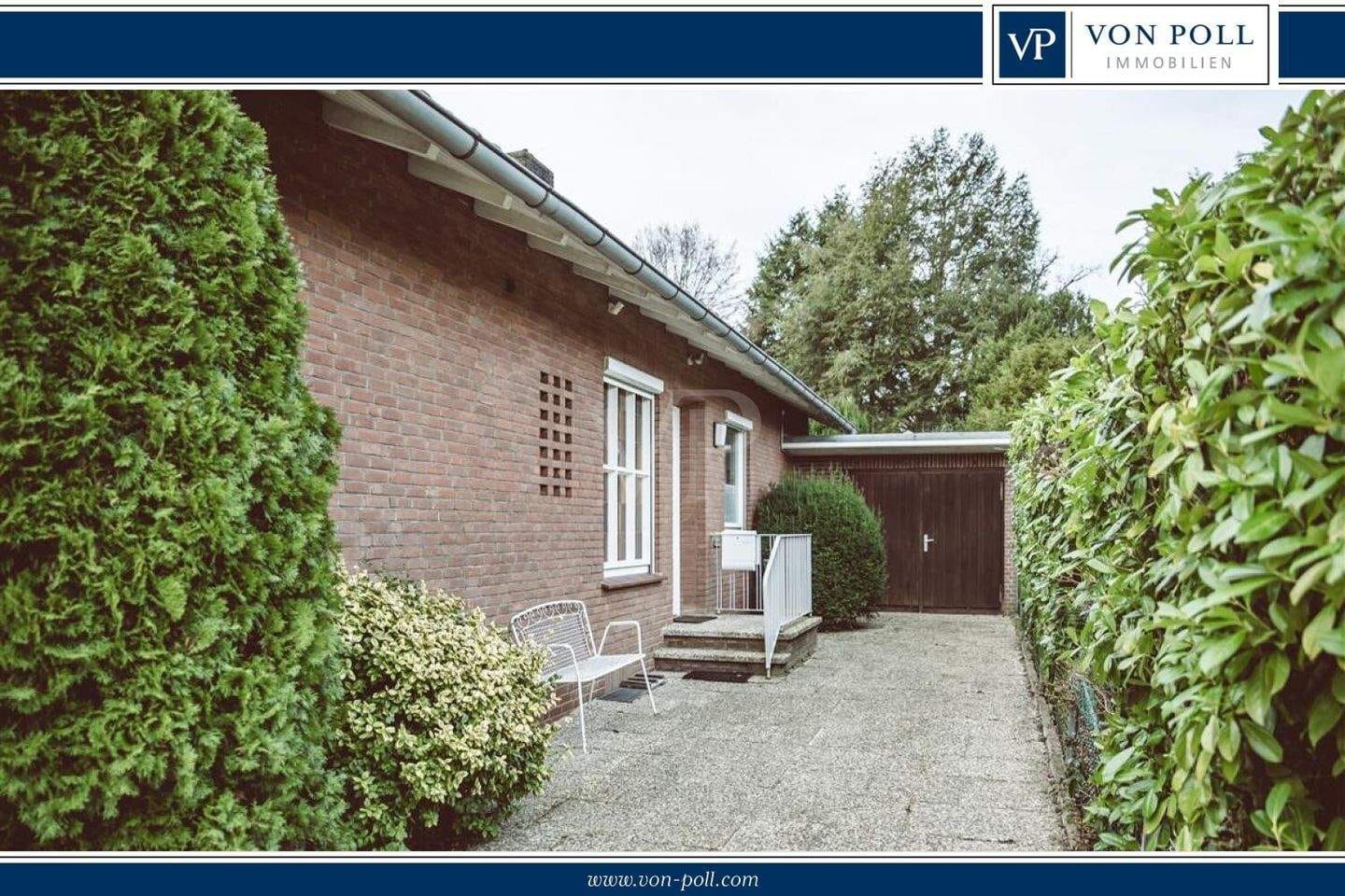 Immobilie in Lüneburg - Bungalow am Kreideberg mit Wintergarten, gepflegter Außenanlage und Ausblick ins Grüne - Bild 0