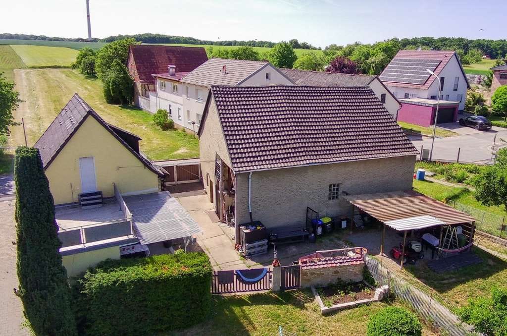 Immobilie in Werneck - Eigenes Haus statt Eigentumswohnung – mit großem Grundstück, Scheune, Dachterrasse und Top Anbindung - Bild 2