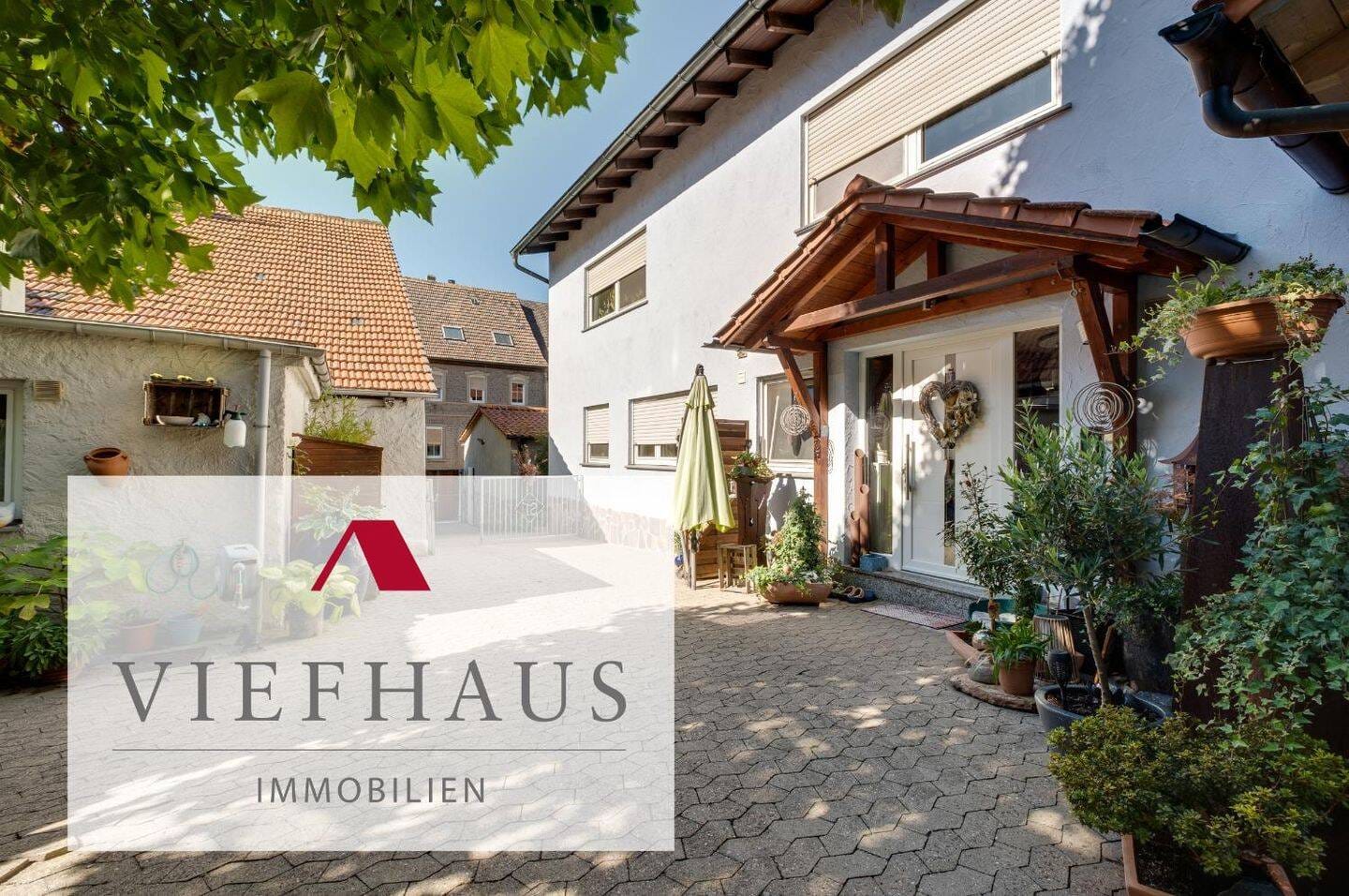 Immobilie in Kitzingen - Zwei Wohnhäuser auf einem Grundstück in Kitzingen - vielseitig nutzbar, modern ausgestattet und mit viel Potential - Bild 0