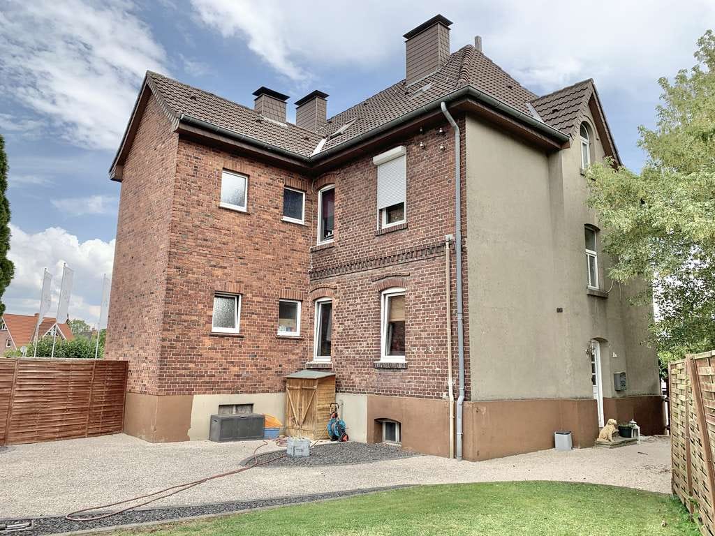 Immobilie in Ennigerloh - 4-Familienhaus in zentraler Wohnlage von Ennigerloh - Bild 1