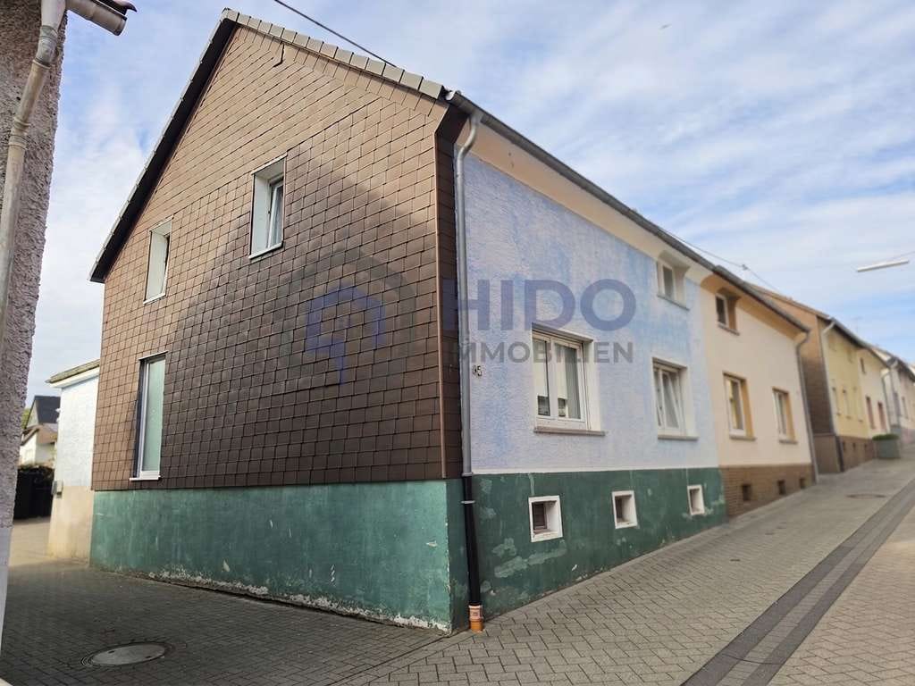 Immobilie in Wirges - Einfamilienhaus in Reihenendlage mit Garten & Garage – modernisiert & mit Gestaltungspotenzial - Bild 0