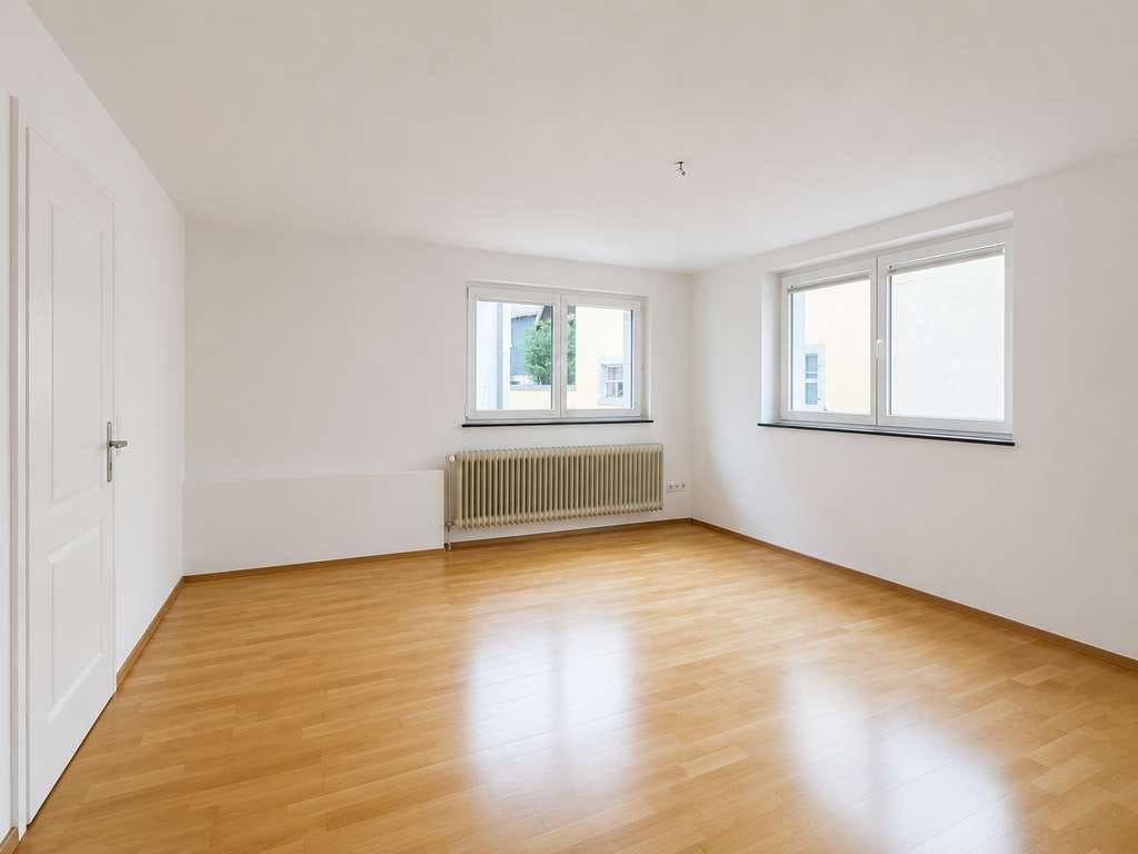 Immobilie in Sasbach am Kaiserstuhl - Historischer Charme auf zwei Ebenen –   Maisonettewohnung im Gebäudeensemble mit Garage - Bild 2
