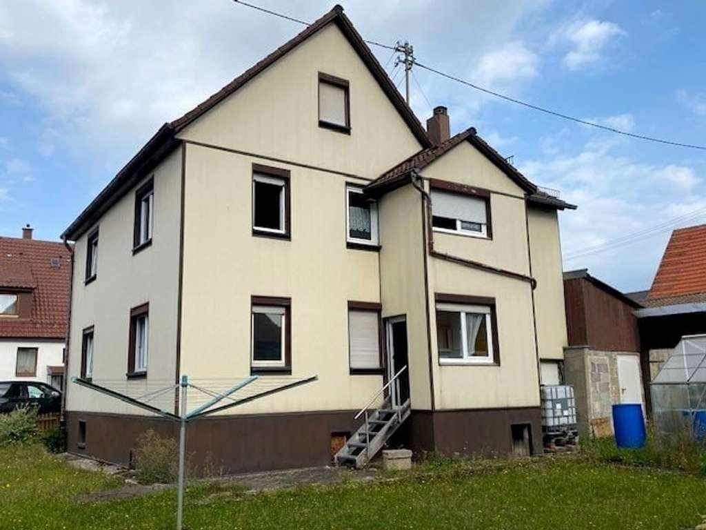Immobilie in Erkenbrechtsweiler - Familienfreundliches Haus mit Garten - Bild 1