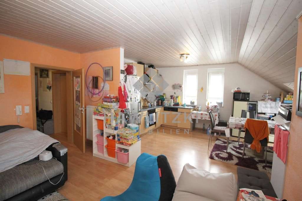 Immobilie in Rülzheim - Sofort frei! Moderne & gemütliche DG-Wohnung mit großer Balkon & KFZ-Stellplatz - Bild 2