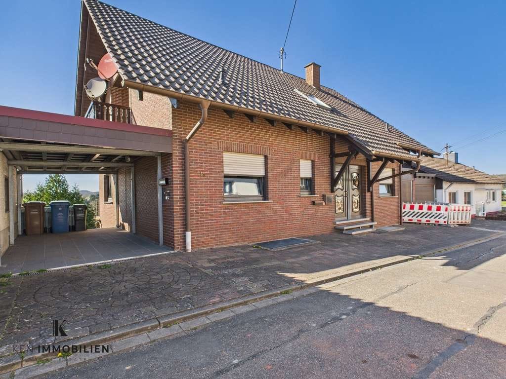 Immobilie in Ramstein-Miesenbach - Großzügiges Wohnhaus mit zwei Wohngeschossen und separater Kellerwohnung in Ramstein-Miesenbach - Bild 0