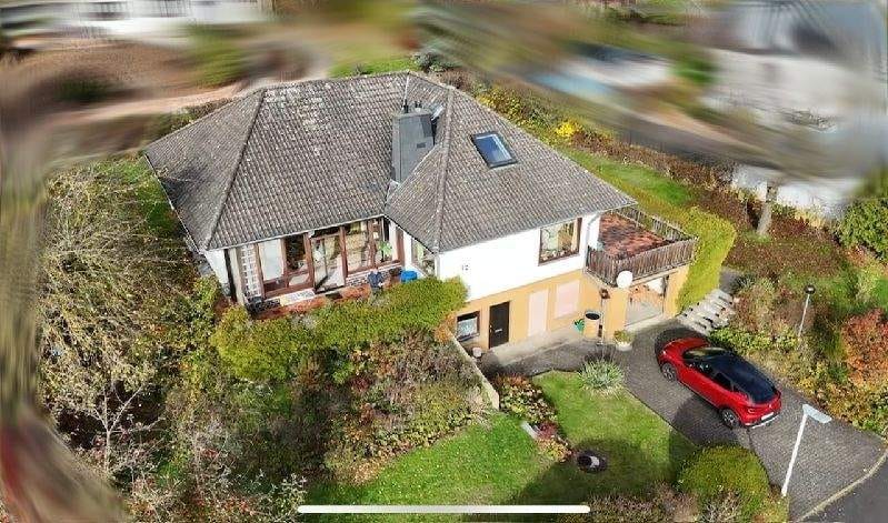 Immobilie in Grebenau - Einfamilienhaus in ruhiger, bevorzugter ruhiger Wohnlage mit Wintergarten und Kamin


 - Bild 2