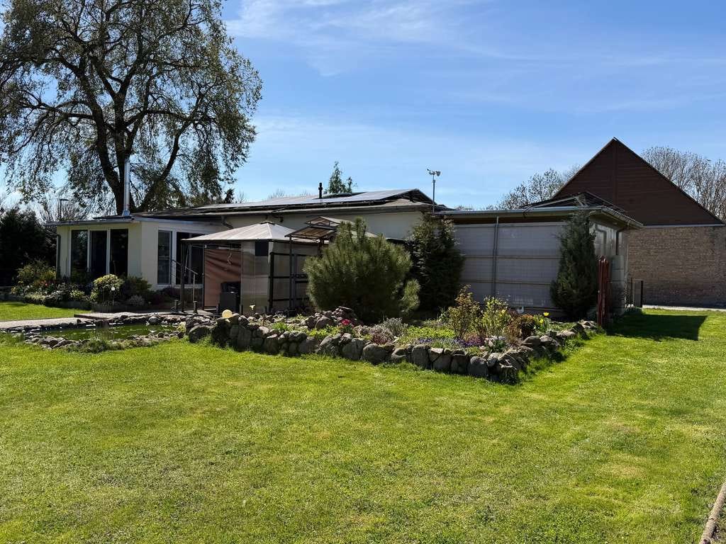 Immobilie in Randowtal - Einladendes Einfamilienhaus mit Wintergarten und Carport in Randowtal - Bild 1