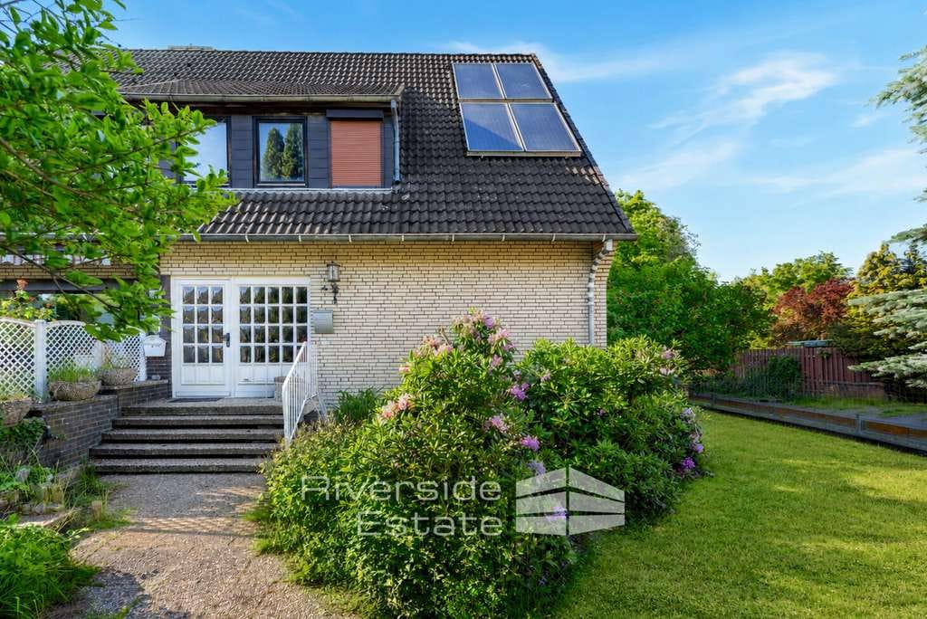 Immobilie in Stuhr - Vermietetes Zweifamilienhaus mit ausgebautem Spitzboden, 2 Garagen & Entwicklungspotenzial - Bild 2