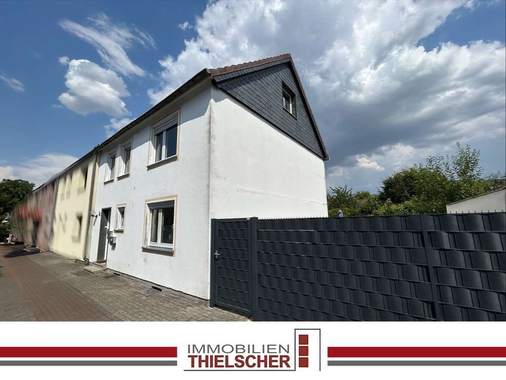 Immobilie in Übach-Palenberg - Ein-/Zweifamilienhaus mit Garten und Garage in Übach-Palenberg - Bild 0