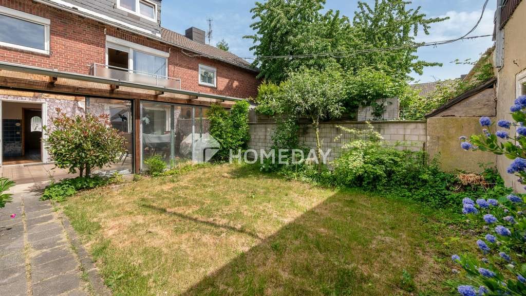 Immobilie in Erkelenz - Beständigkeit und Zukunft: Reihenhaus mit Garage, Partykeller, PV-Anlage und Solarthermie - Bild 2