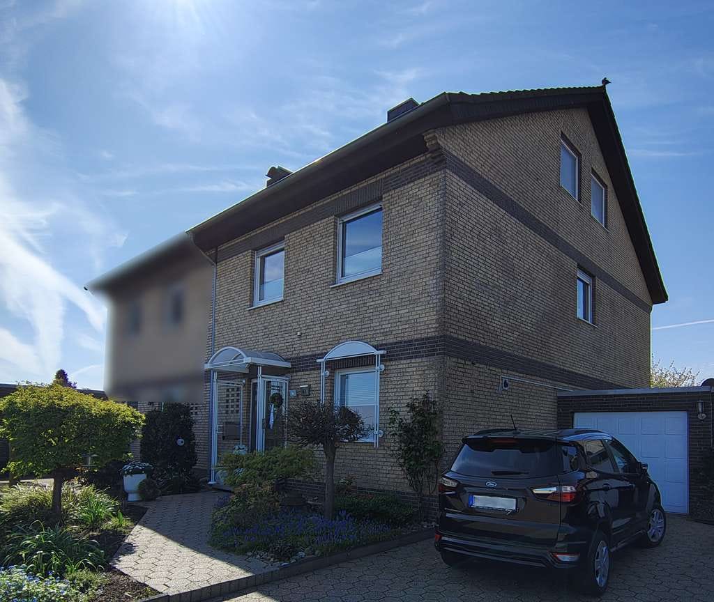 Immobilie in Isselburg - Startklar fürs Familienleben - helle Doppelhaushälfte mit Charme - Bild 1