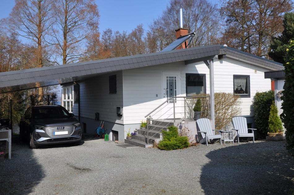 Immobilie in Bünsdorf - Einzigartiges Seeanwesen – Hochwertiges Traumhaus in erster Reihe - Bild 1