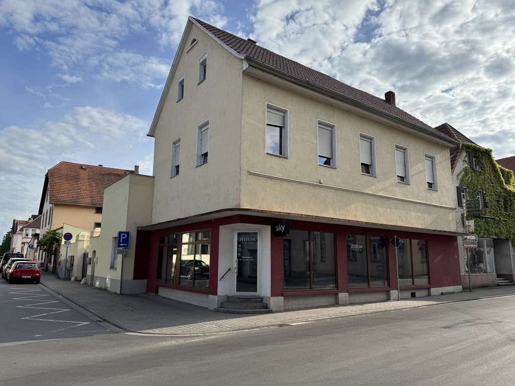 Immobilie in Osthofen - Attraktives Mehrfamilienhaus mit Ladengeschäft und Entwicklungspotenzial in begehrter Lage - Bild 0