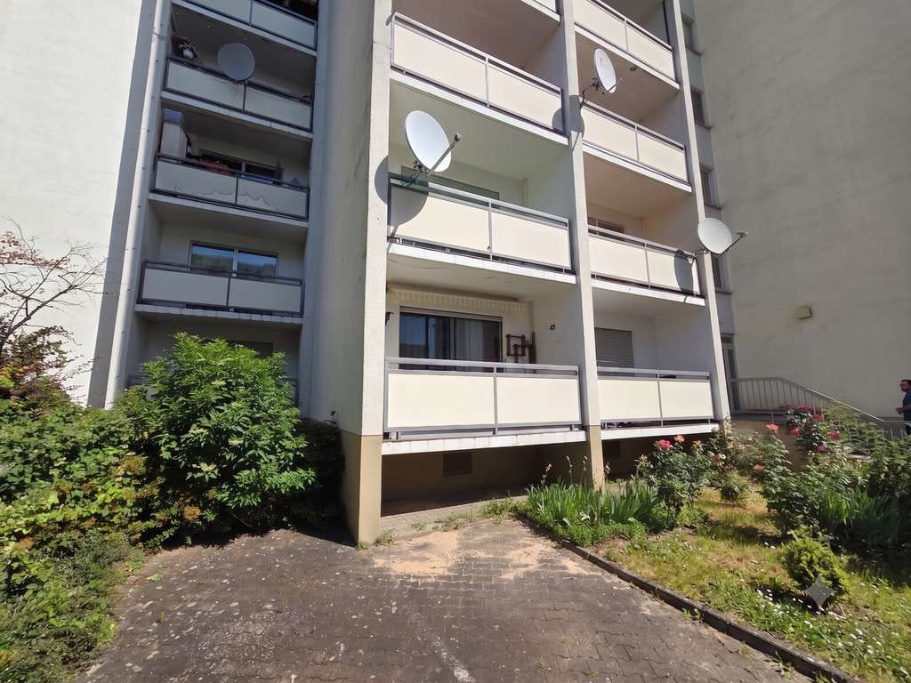 Immobilie in Rüsselsheim am Main - 2-Zimmer-Erdgeschosswohnung mit ca. 55 m², Küche, Bad, Diele, Balkon, Keller & zugewiesenem TG-Platz - Bild 0