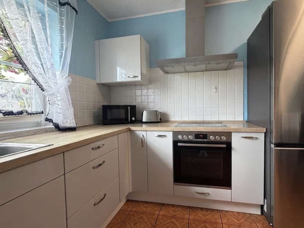 Immobilie in Hohn - Familienfreundliches Zuhause mit großem Garten und Sauna - Bild 4