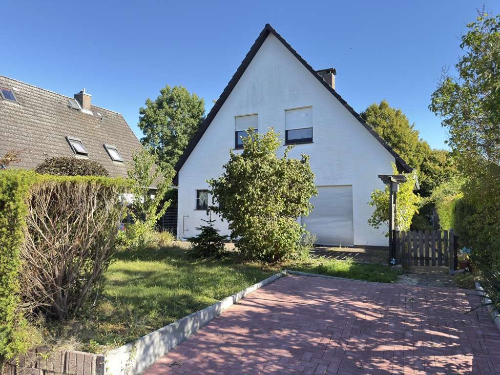Immobilie in Wedel - Geräumige Doppelhaushälfte - ruhig gelegen und mit kleinem Garten - Bild 0