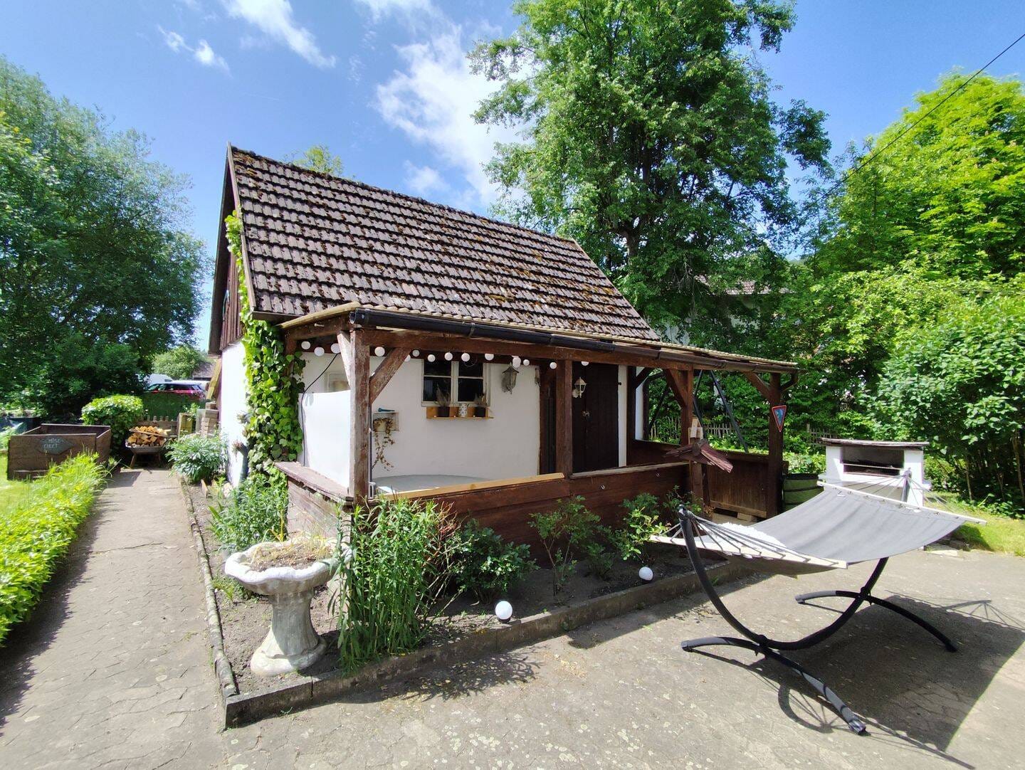 Immobilie in Trebgast - Historischer Charme trifft moderne Nachhaltigkeit: Liebevoll saniertes Einfamilienhaus in 95349 Trebgast mit Werkstatt, Garten und PV-Autarkie! - Bild 1