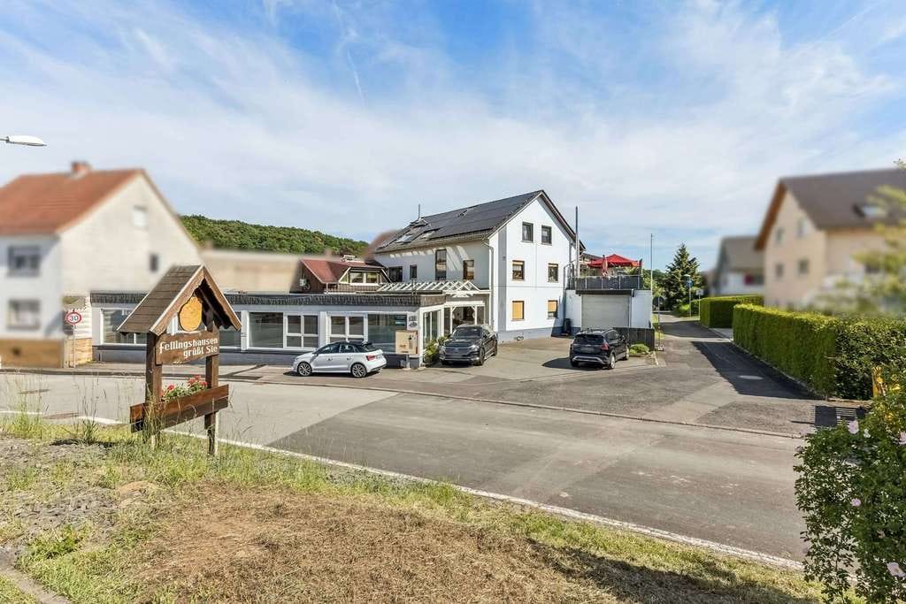 Immobilie in Biebertal - Raum für Ideen – vielseitige Immobilie mit vier Wohneinheiten und Gewerbepotenzial - Bild 0