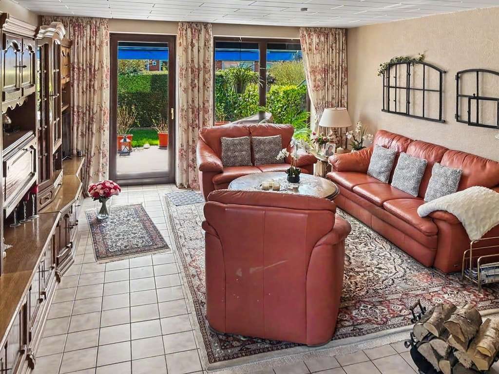 Immobilie in Quarnbek - Wohnkomfort mit Charakter – Reihenendhaus mit Kamin und Garten in Kiel - Bild 3