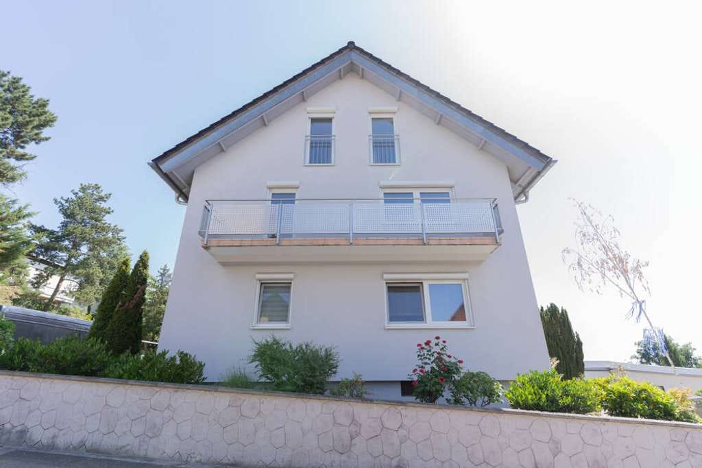 Immobilie in Weisenheim am Sand - Saniertes, freistehendes Dreifamilienhaus mit Innenhof und Garagen! - Bild 4