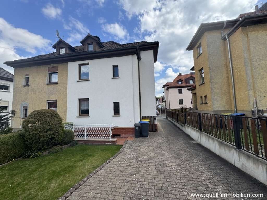 Immobilie in Vacha - Gepflegte DHH mit Keller, Garage u. kleinem Grst. in guter Lage von Vacha zu verkaufen - Bild 1