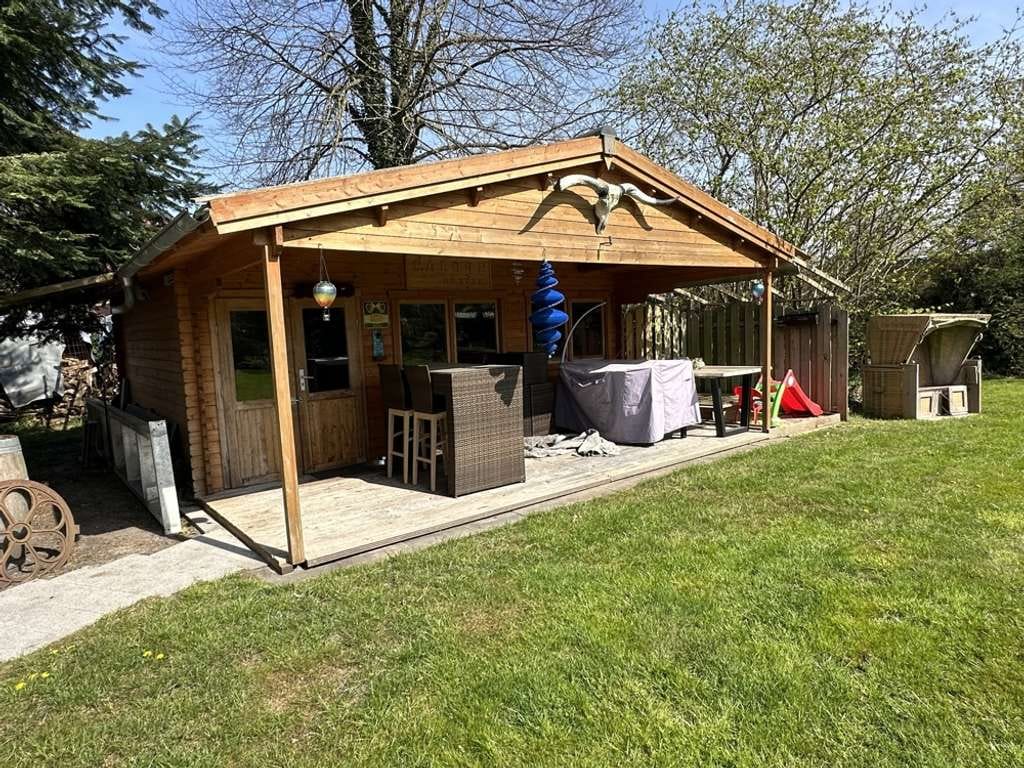 Immobilie in Ostrhauderfehn - Tolles Einfamilienhaus mit Einlieger- und Obergeschosswohnung im Herzen von Ostrhauderfehn! - Bild 3