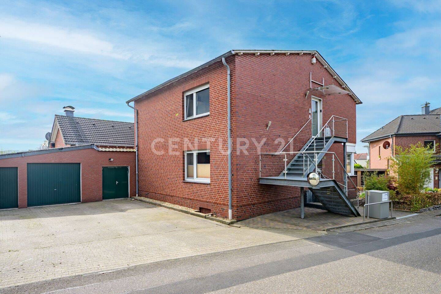 Immobilie in Wassenberg - C21-Freistehendes Einfamilienhaus mit Einliegerwohnung - Bild 1