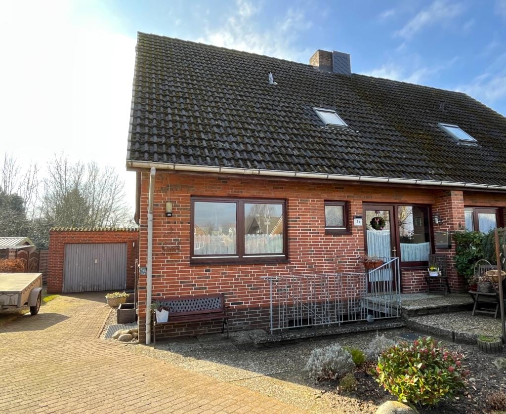 Immobilie in Drage - Familienfreundliches Zuhause mit Garage in idyllischer Dorflage - Bild 1