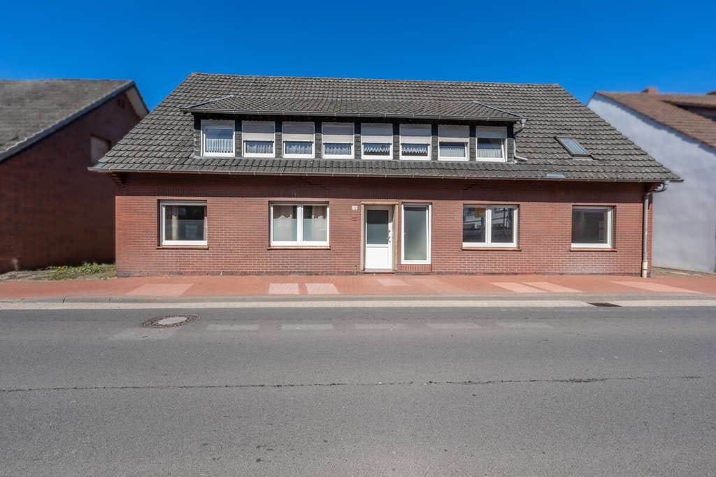 Immobilie in Neuenkirchen-Vörden - Kapitalanlage: Vermietetes Mehrfamilienhaus mit Potenzial - Bild 1