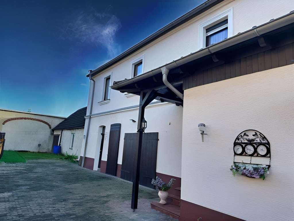 Immobilie in Mockrehna - Wohnen in Mockrehna - Einfamilienhaus mit viel Potential - Bild 1