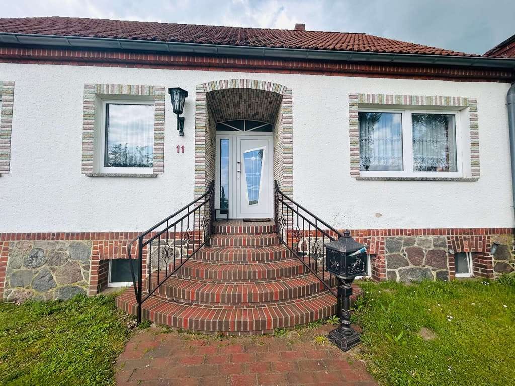 Immobilie in Plattenburg - Einfamilienhaus mit Garten und Garage - Bild 1