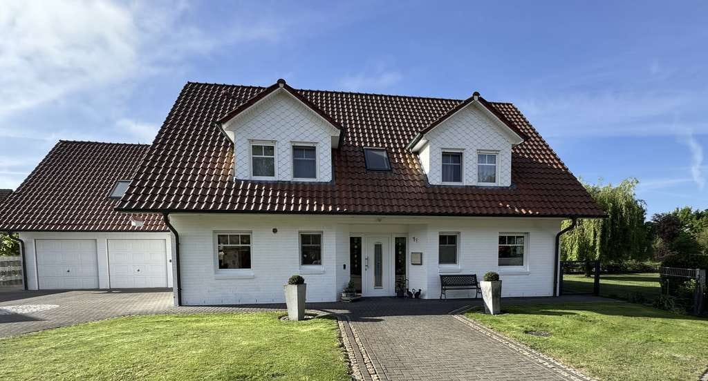 Immobilie in Grethem - Gepflegtes Architektenhaus mit Einliegerwohnung 259 m² Wfl. in Grethem auf 2.000m² - Bild 1