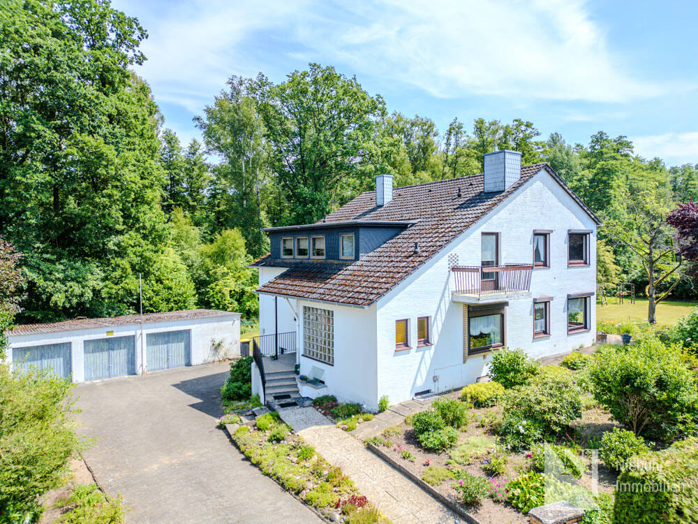 Immobilie in Vögelsen - Großzügiges Zweifamilienhaus auf parkähnlichem Grundstück in Vögelsen - Bild 0