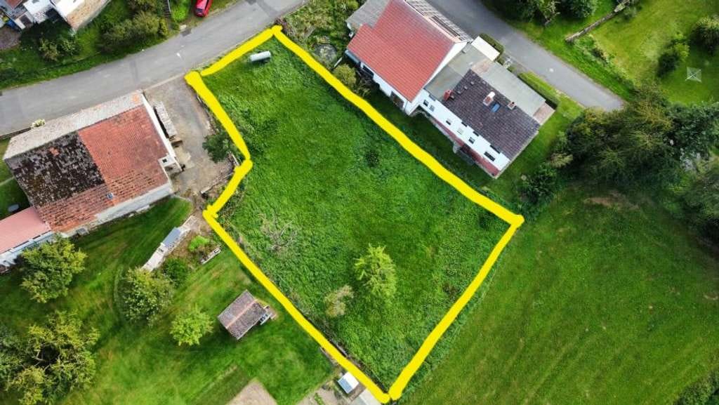 Immobilie in Gilserberg - Der Bungalow mit der charmanten Form in Gilserberg OT Sebbeterode – ausgefallen und praktisch - Bild 2