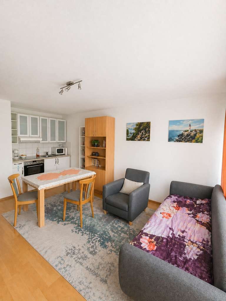 Immobilie in Unterhaching - 1-Zimmer Apartment mit Terrasse/Gartenanteil und Außenstellplatz - Bild 0